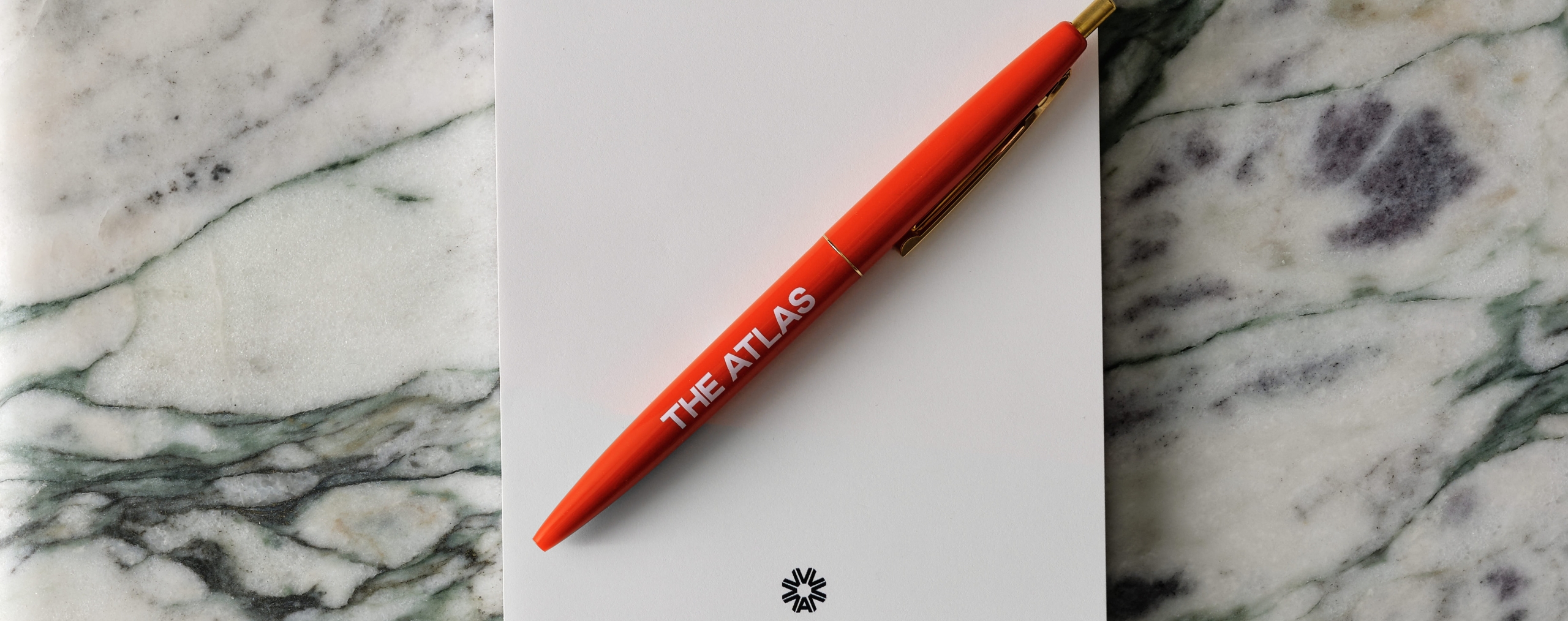 atlas pen on side table