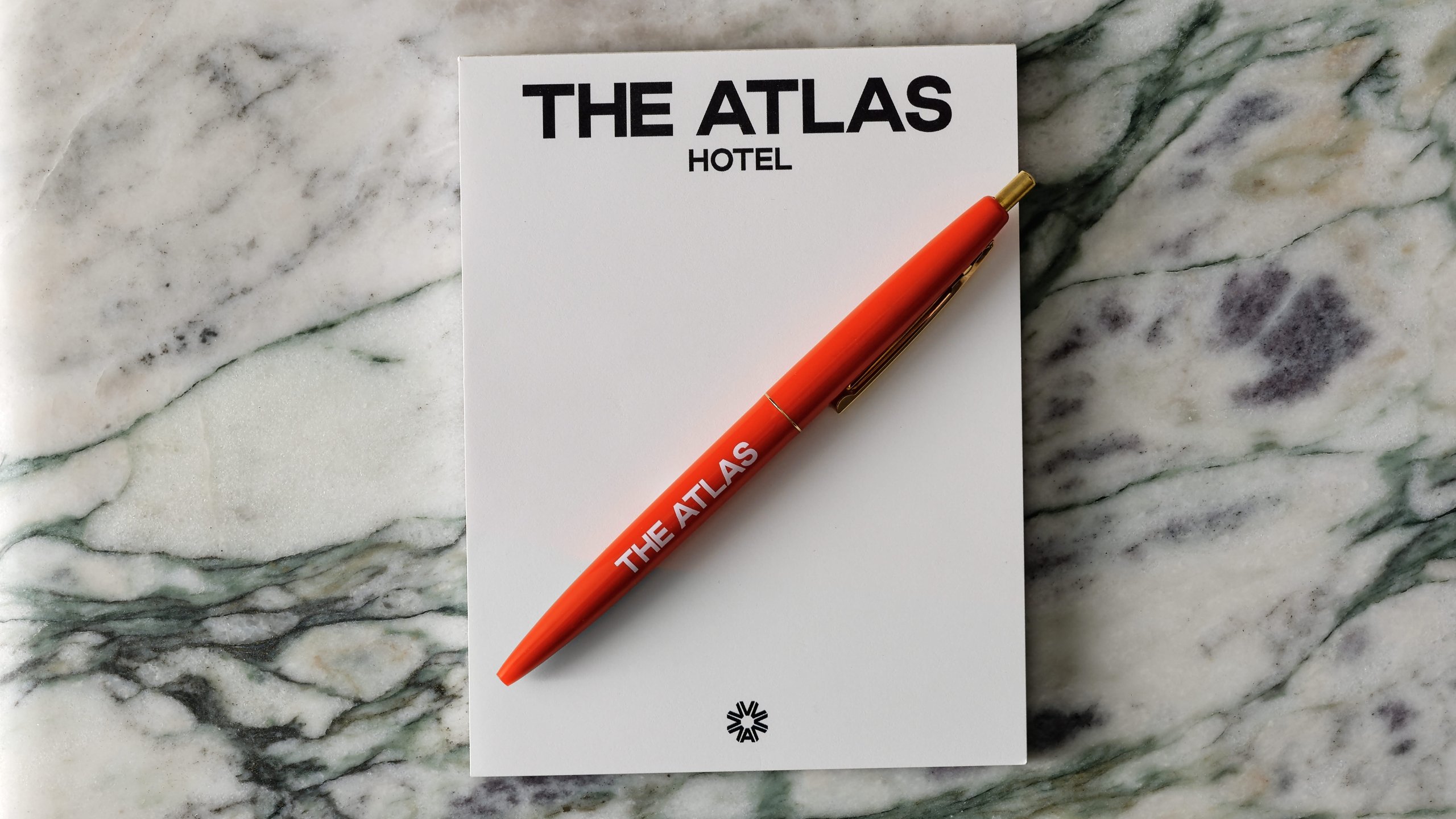 Atlas hotel notepad and pen wide